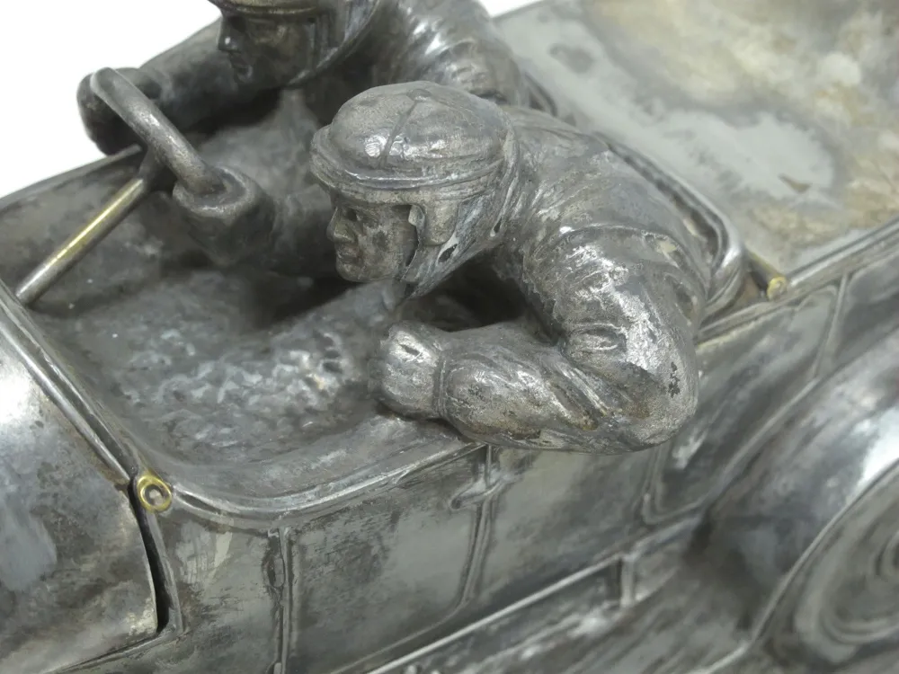 Antique inkwell with car design, fine details