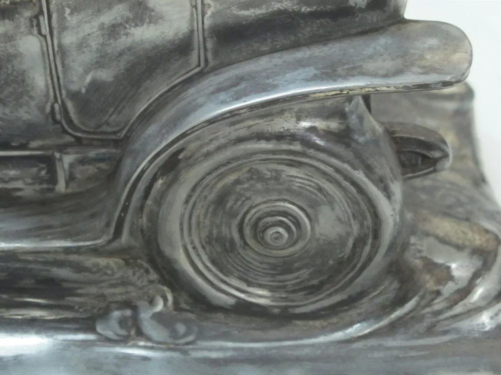 Tintero antiguo WMF con diseño elegante y formas clásicas.