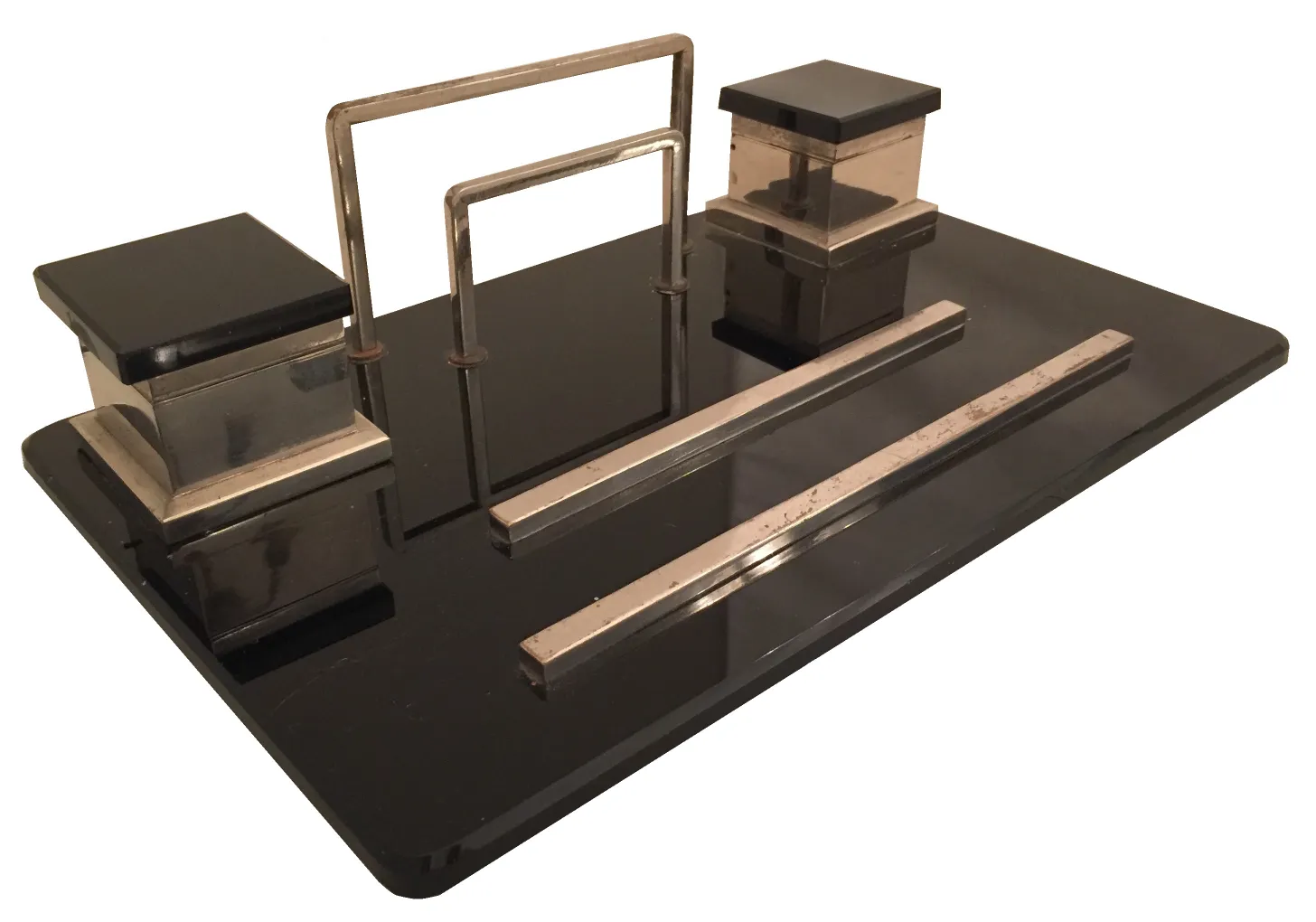 Antique desk inkwell with a rectangular shape and metallic details.