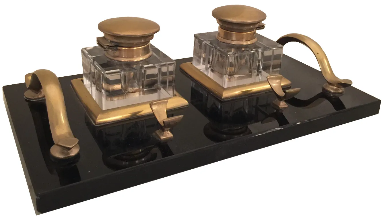 antique inkwell with two deposits on a dark base