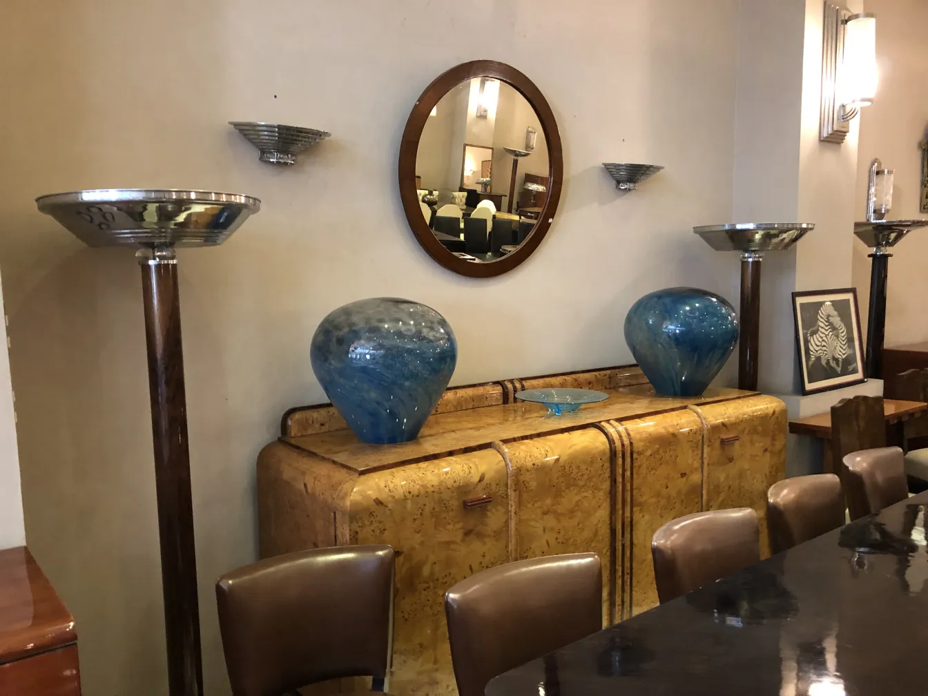 antique wall sconces with a mirror and decorations