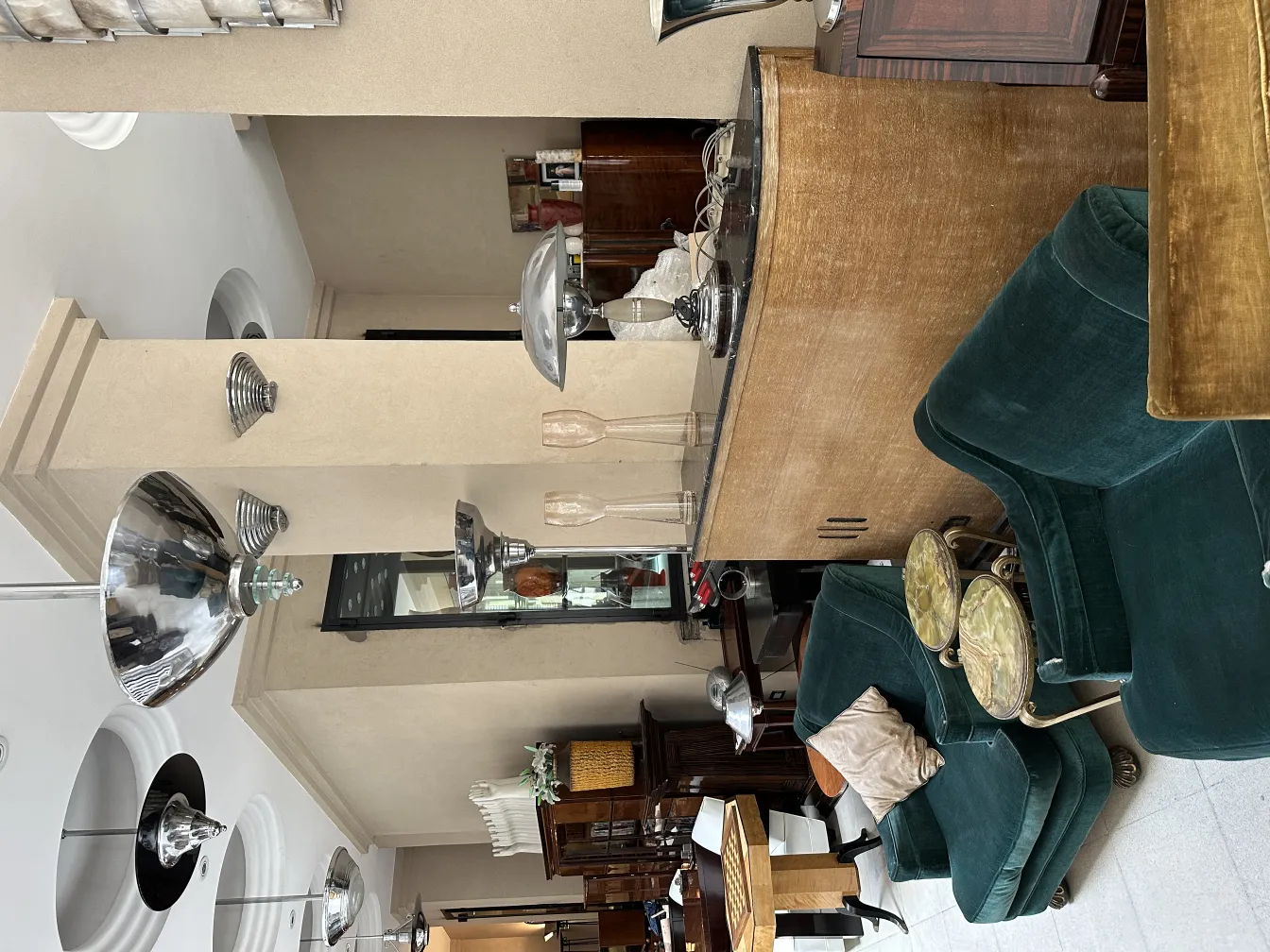 Pair of antique sconces, featuring a classic design, illuminating a cozy space.