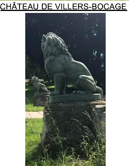 Antique statue of 2 lions by A. Durenne in a green setting.