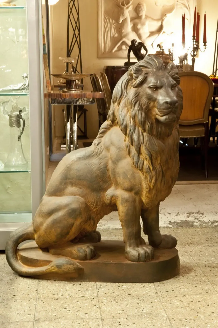 scultura antica di due leoni di A. Durenne con dettagli