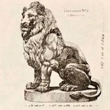antique sculpture of two lions on a base with details