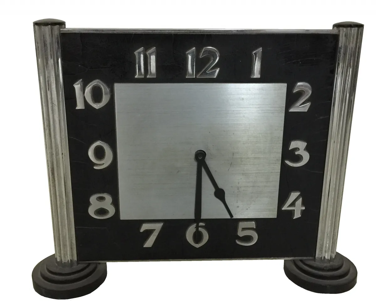 orologio da tavolo antico nero con grandi numeri