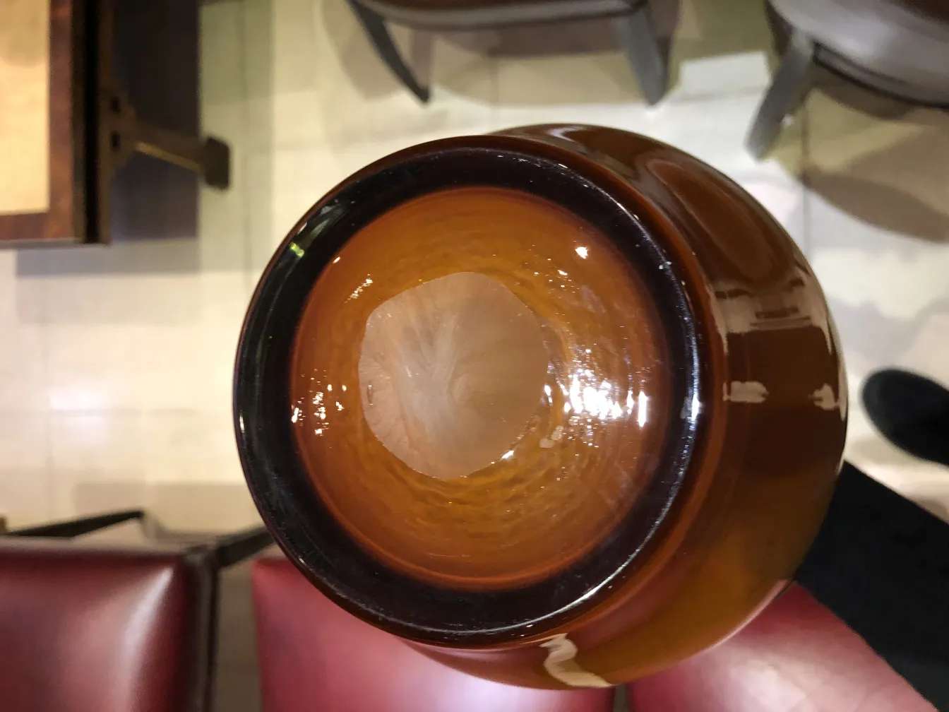 antique vase with round shape and brown color