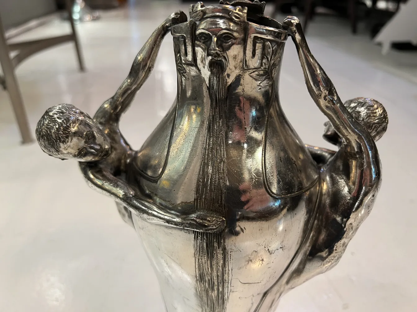 antique vase decorated with human figures, elegant design