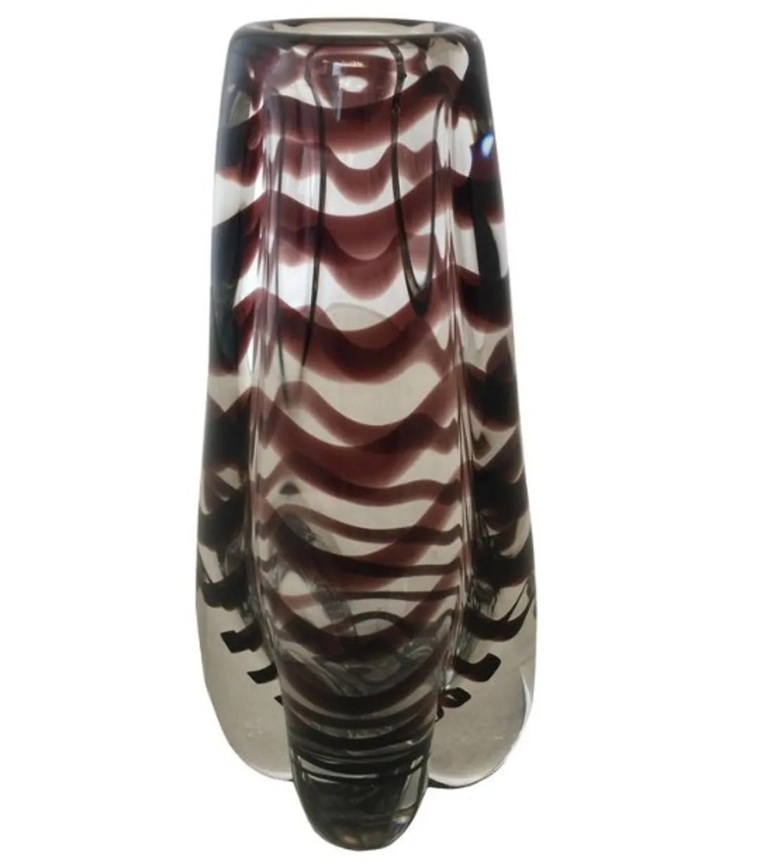 antique vase with wavy design in brown tones