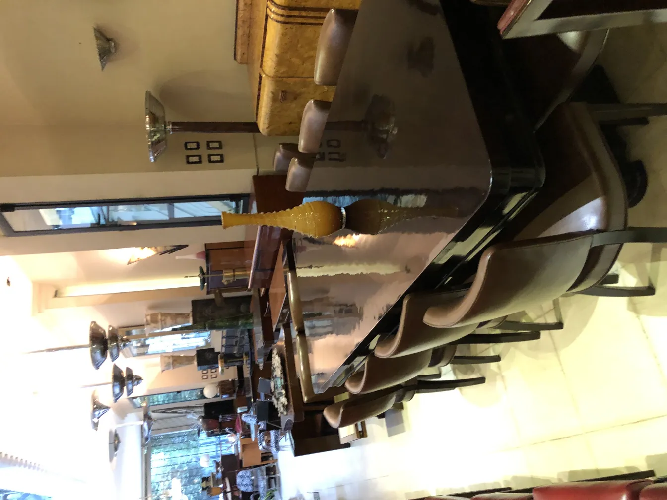 antique yellow decorative vase on an elegant dining table