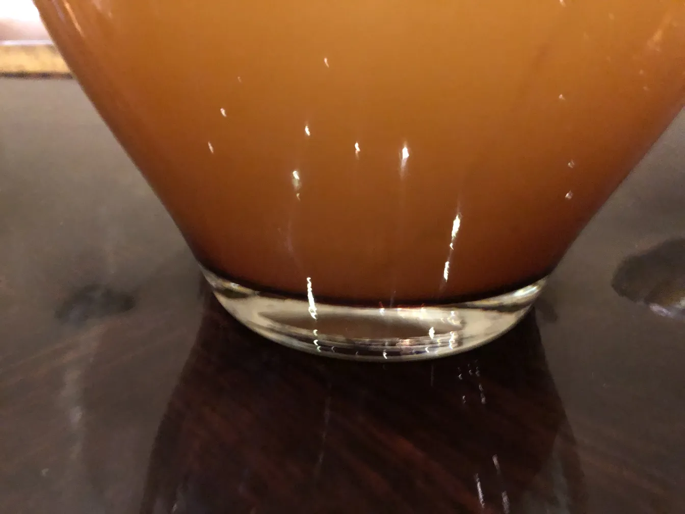 antique vase with classic design in brown tones, placed in an elegant setting