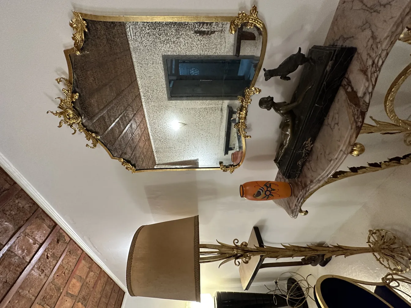 Antique decorative vase, background with mirror and lamp