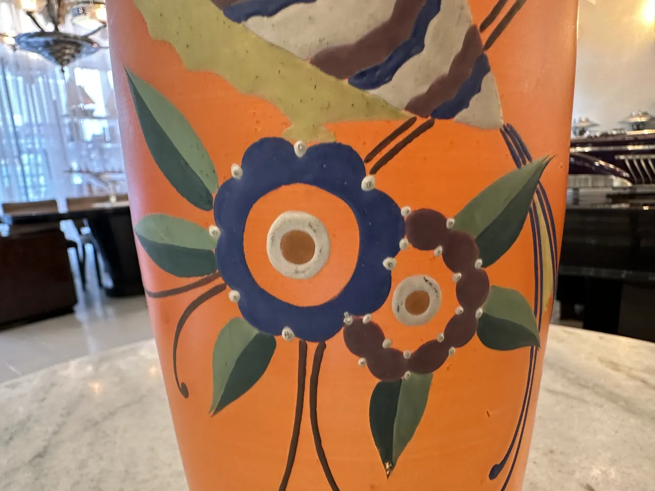 antique ceramic vase with colorful floral design