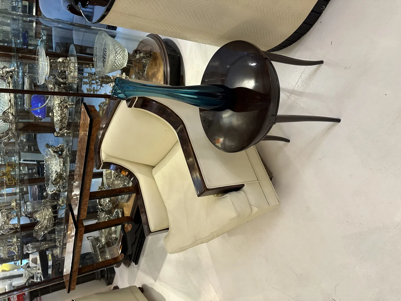 elegant antique vase in an antiques setting, adorning a table