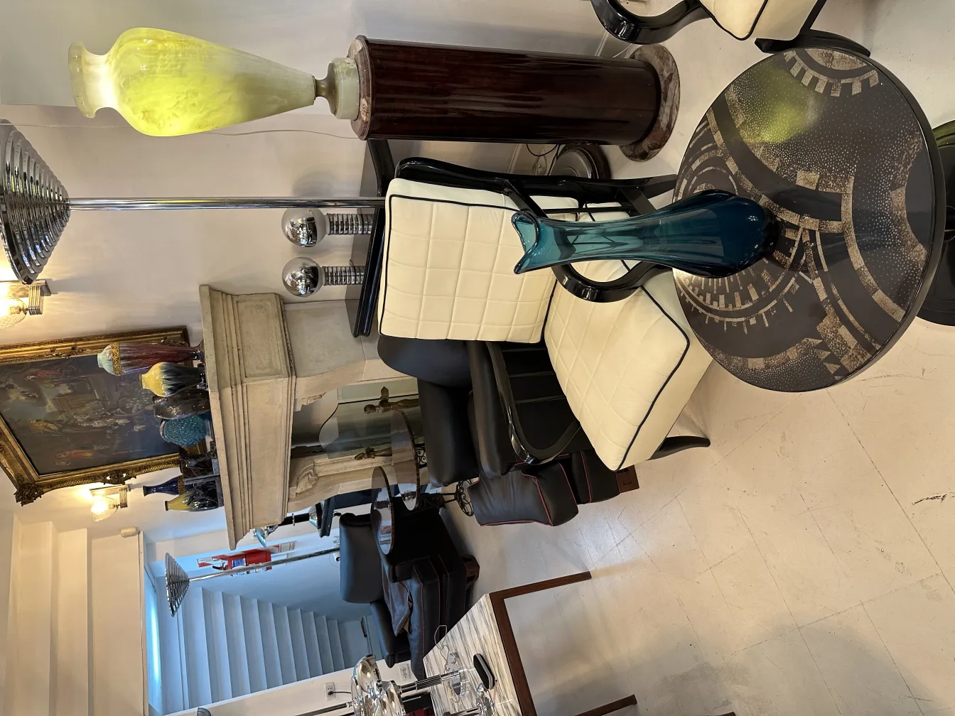 antique blue vase on a decorative table in the background