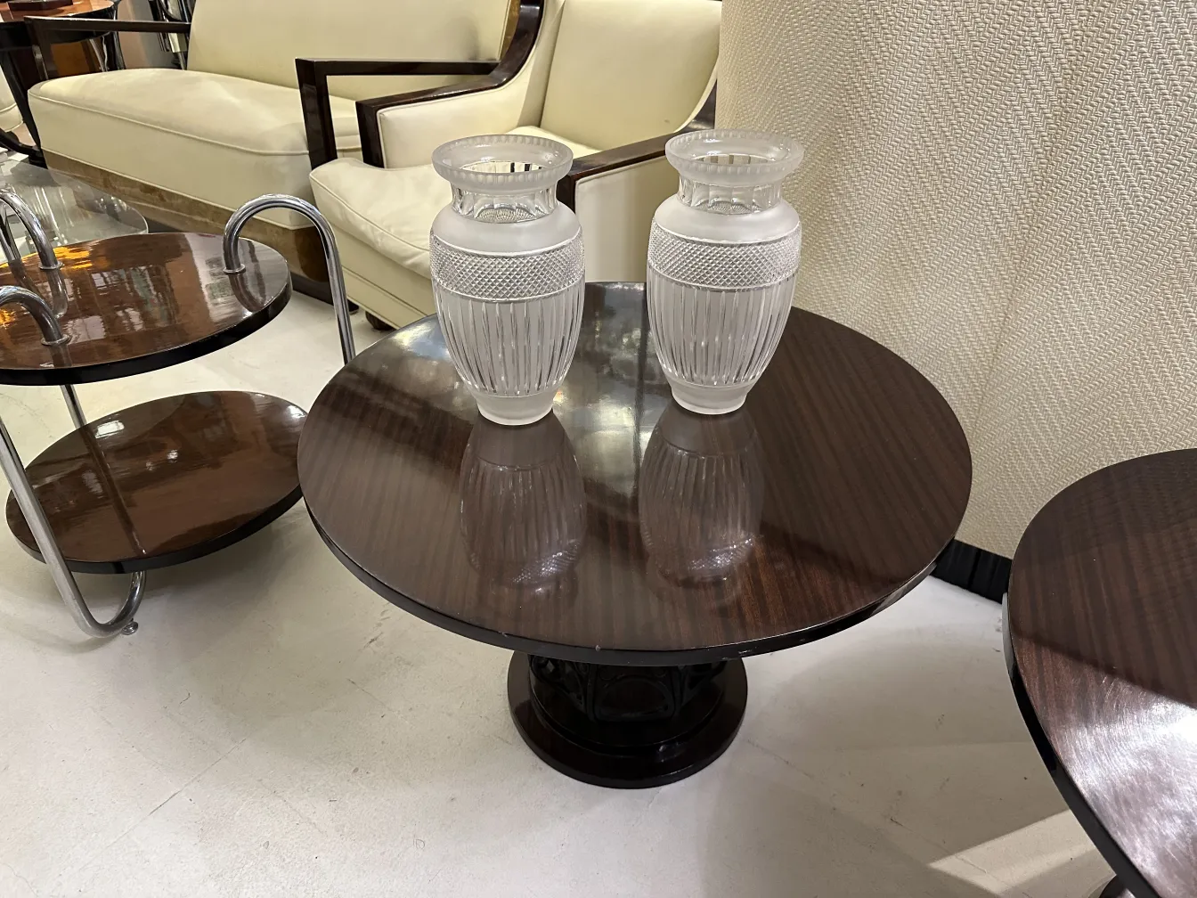 two antique vases with elegant design on table