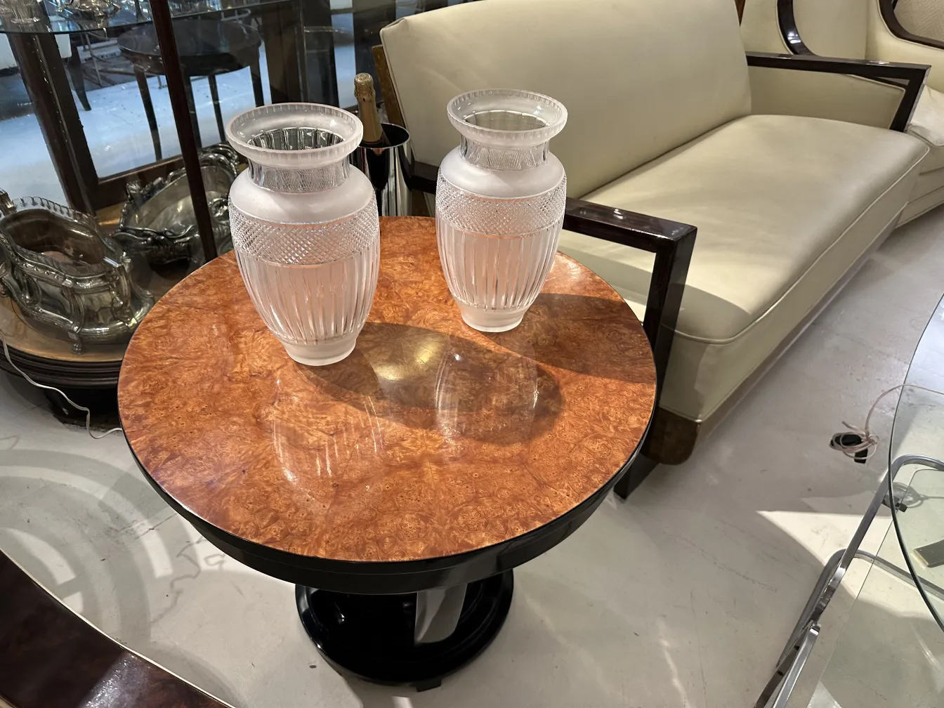 Two decorative antique vases on a marble table, modern background