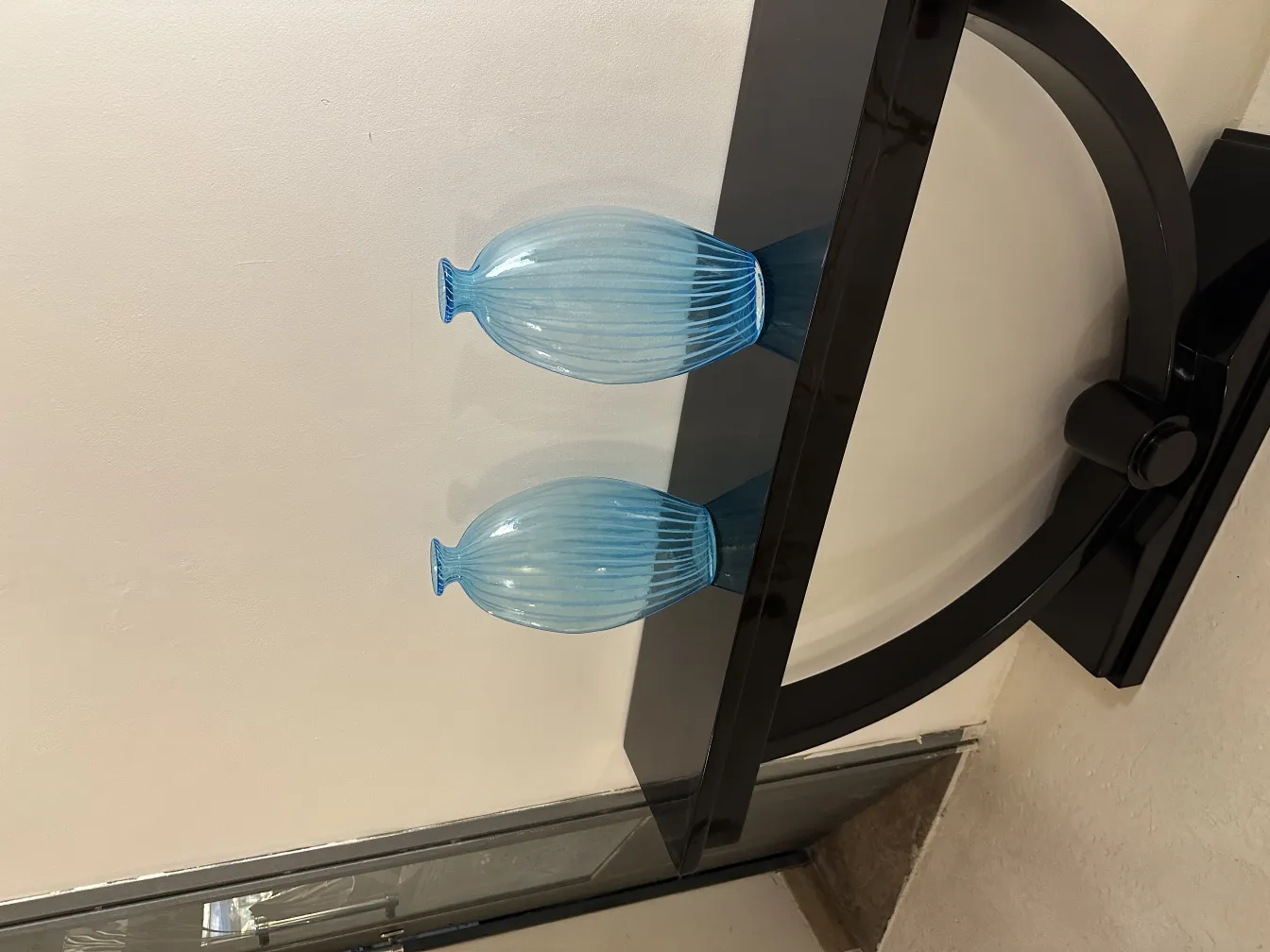 Two antique vases in blue color on a table