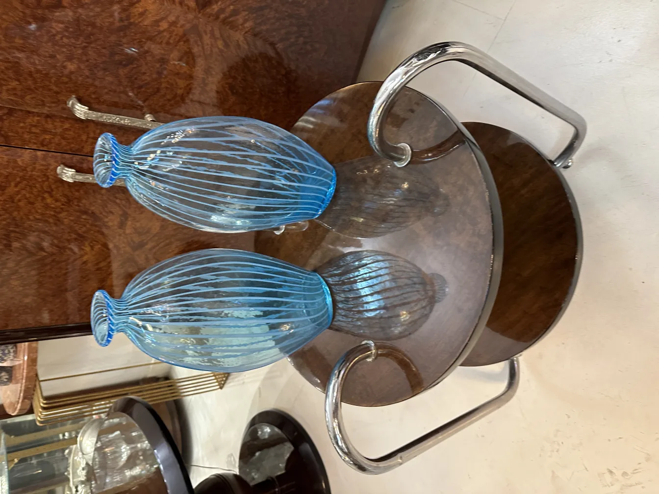 Two antique vases, elegantly shaped with fine lines and a classic setting