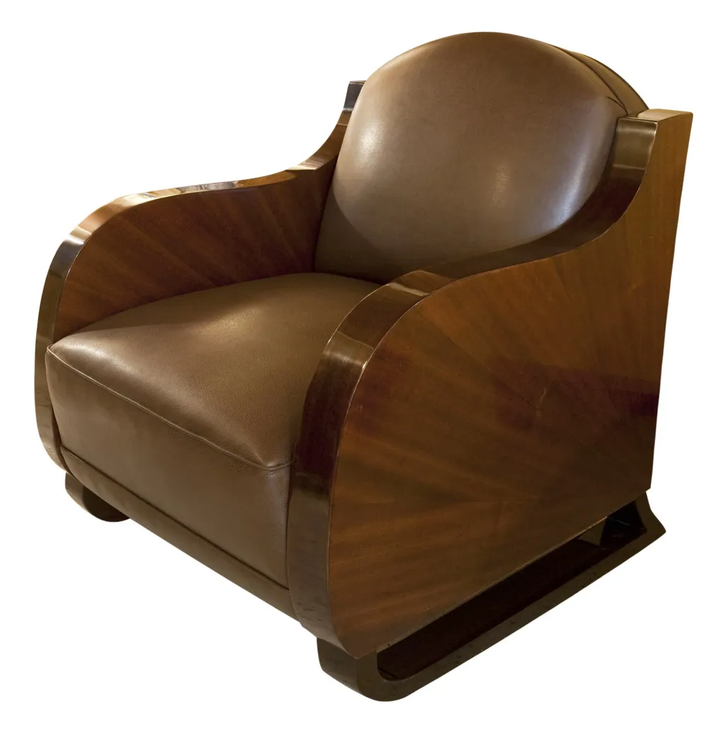 2 antique art deco armchairs in a cozy setting