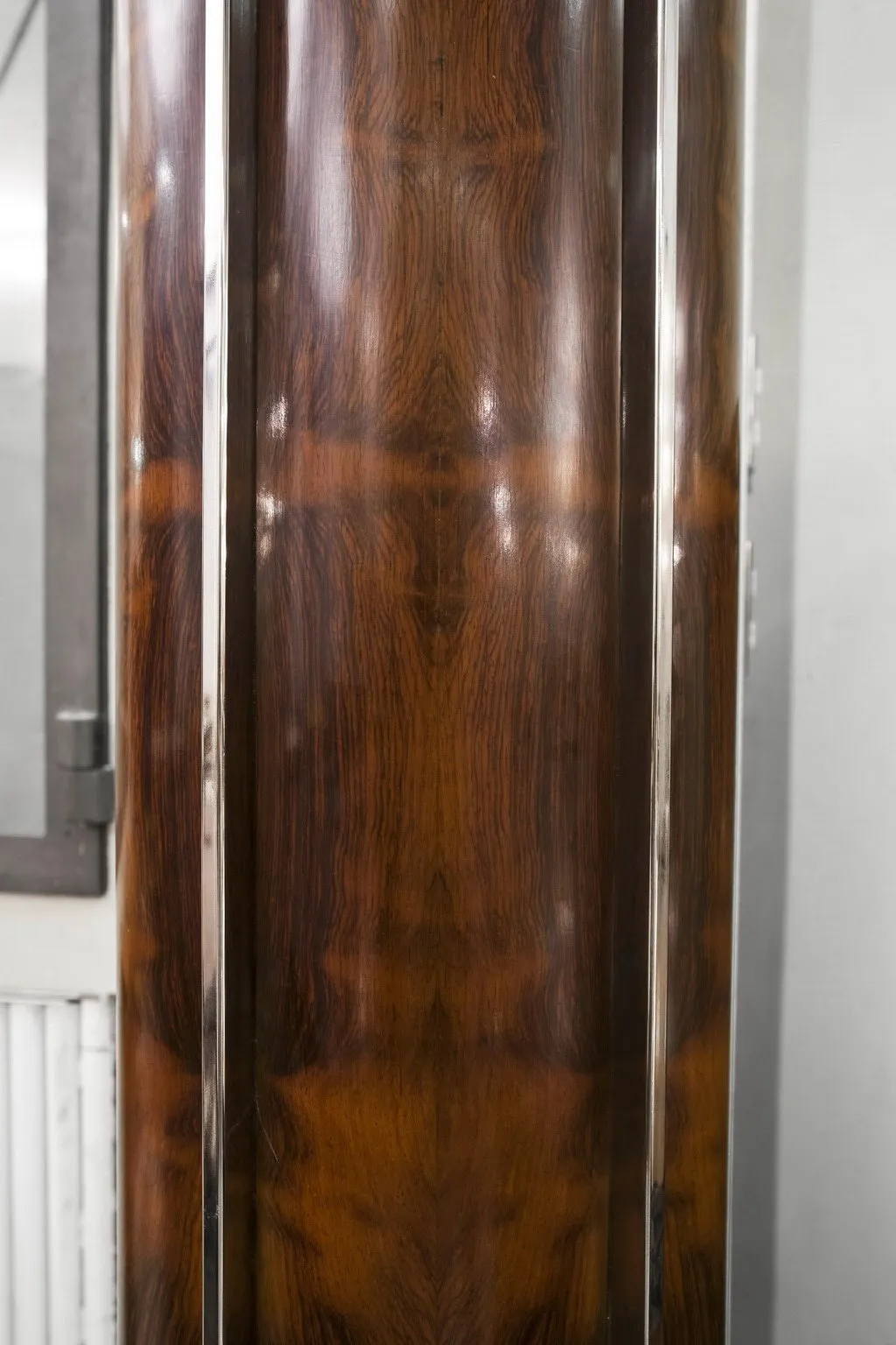 Two antique art deco floor lamps in a classic setting.