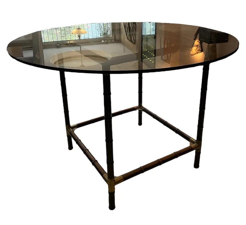 Antique dining table for 4 people, elegant design in a modern setting.