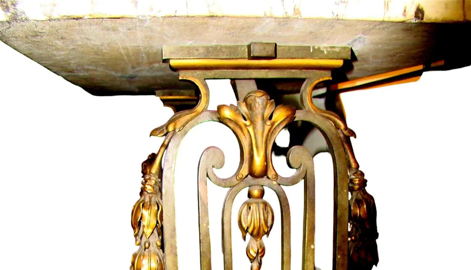 Antique decorative console with elegant design and ornamental details.
