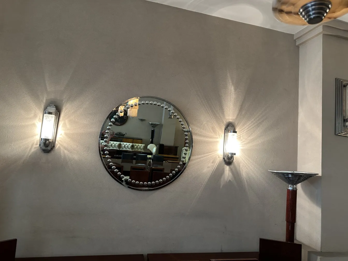 espejo redondo antiguo con detalles en art deco