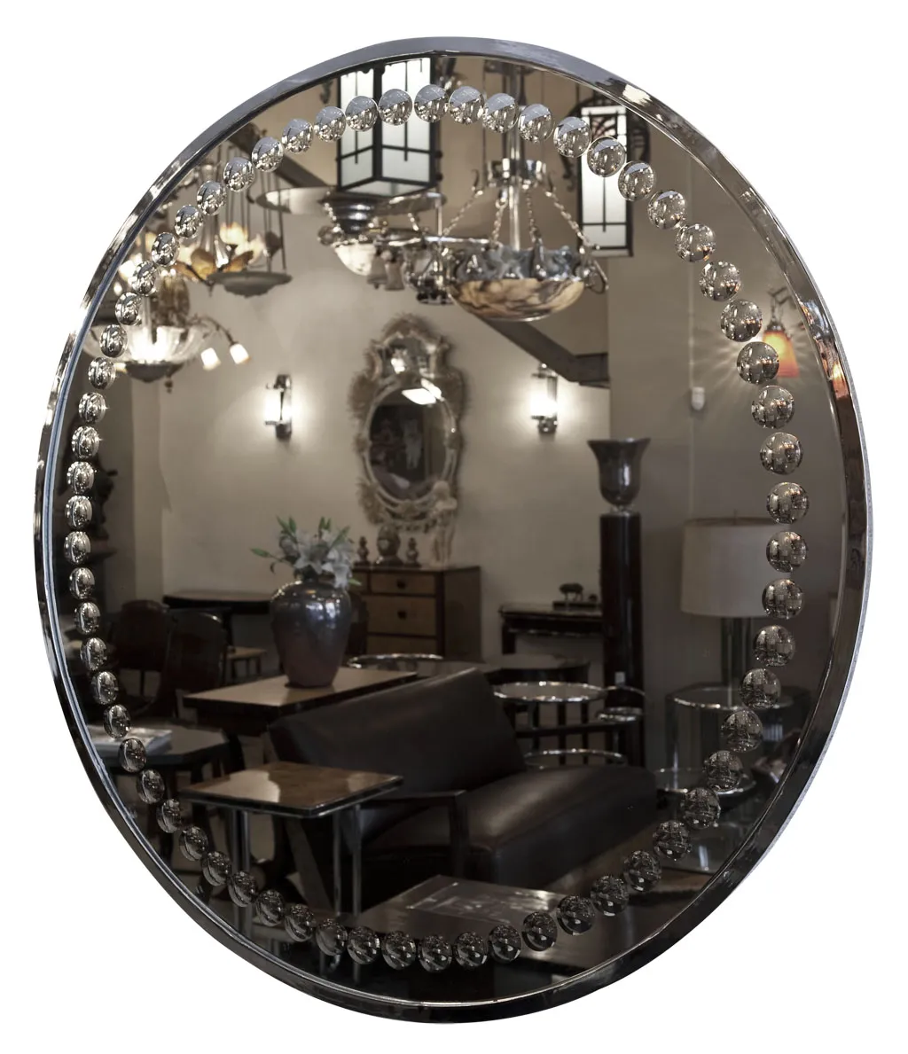miroir ancien de style art déco dans un environnement élégant avec des meubles