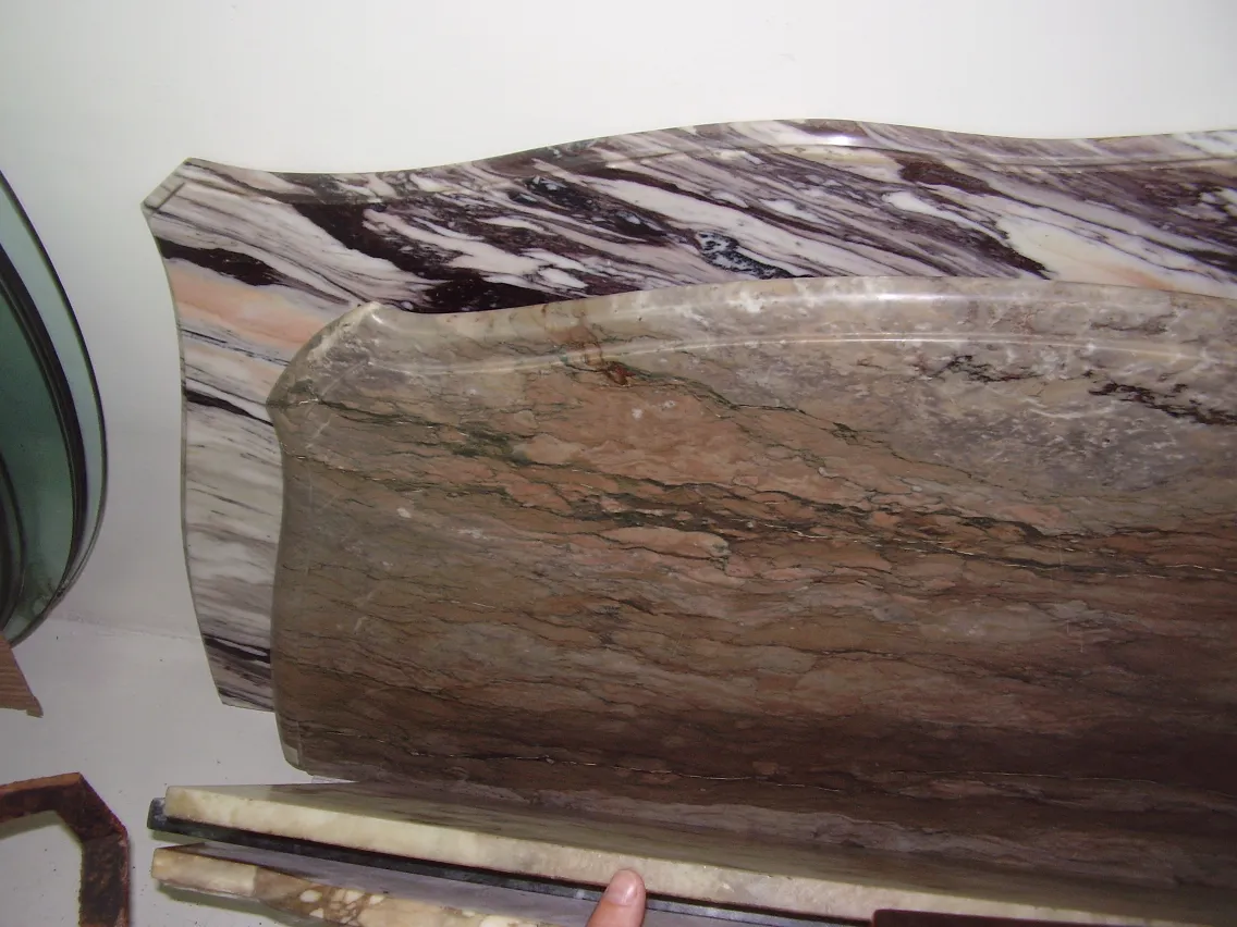 Antique console with decorative design in brown tones.