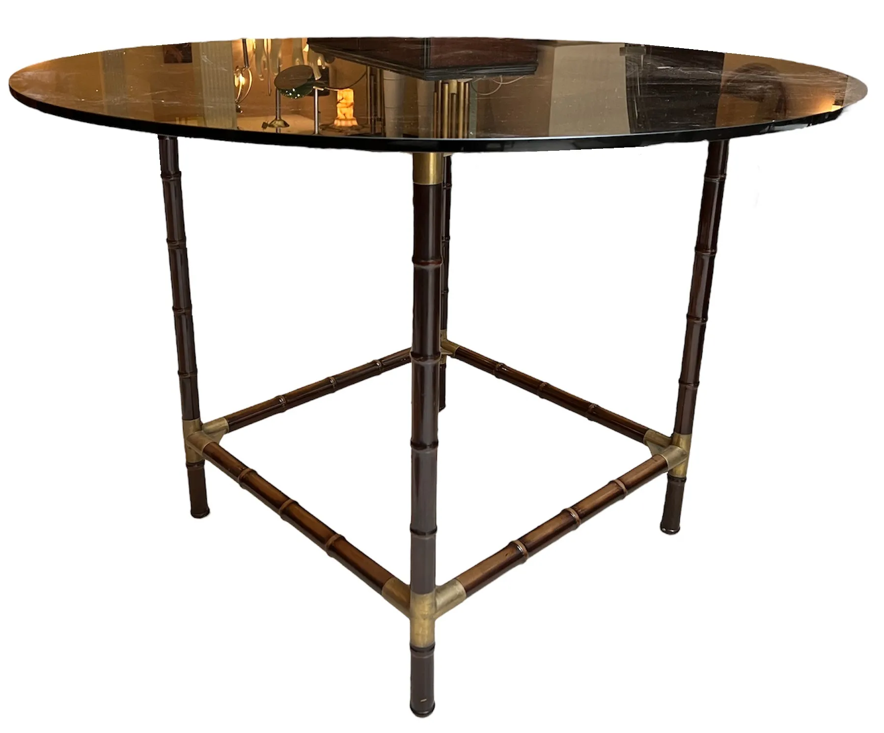 round antique dining table with tubular base, cozy ambiance