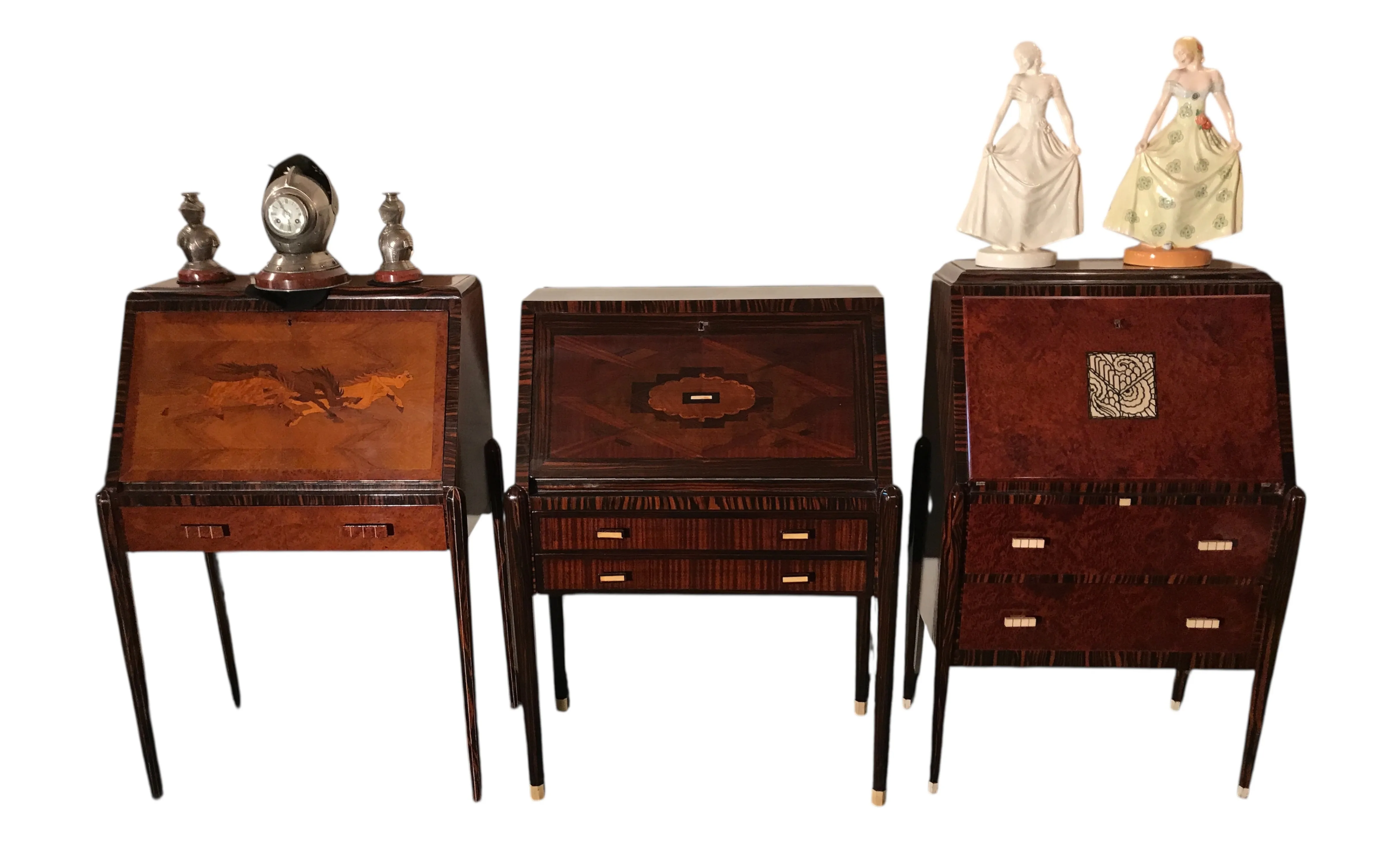 antique desk with two decorative figures and a clock on top