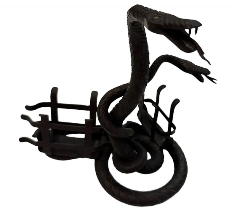 antique card tray featuring serpent details