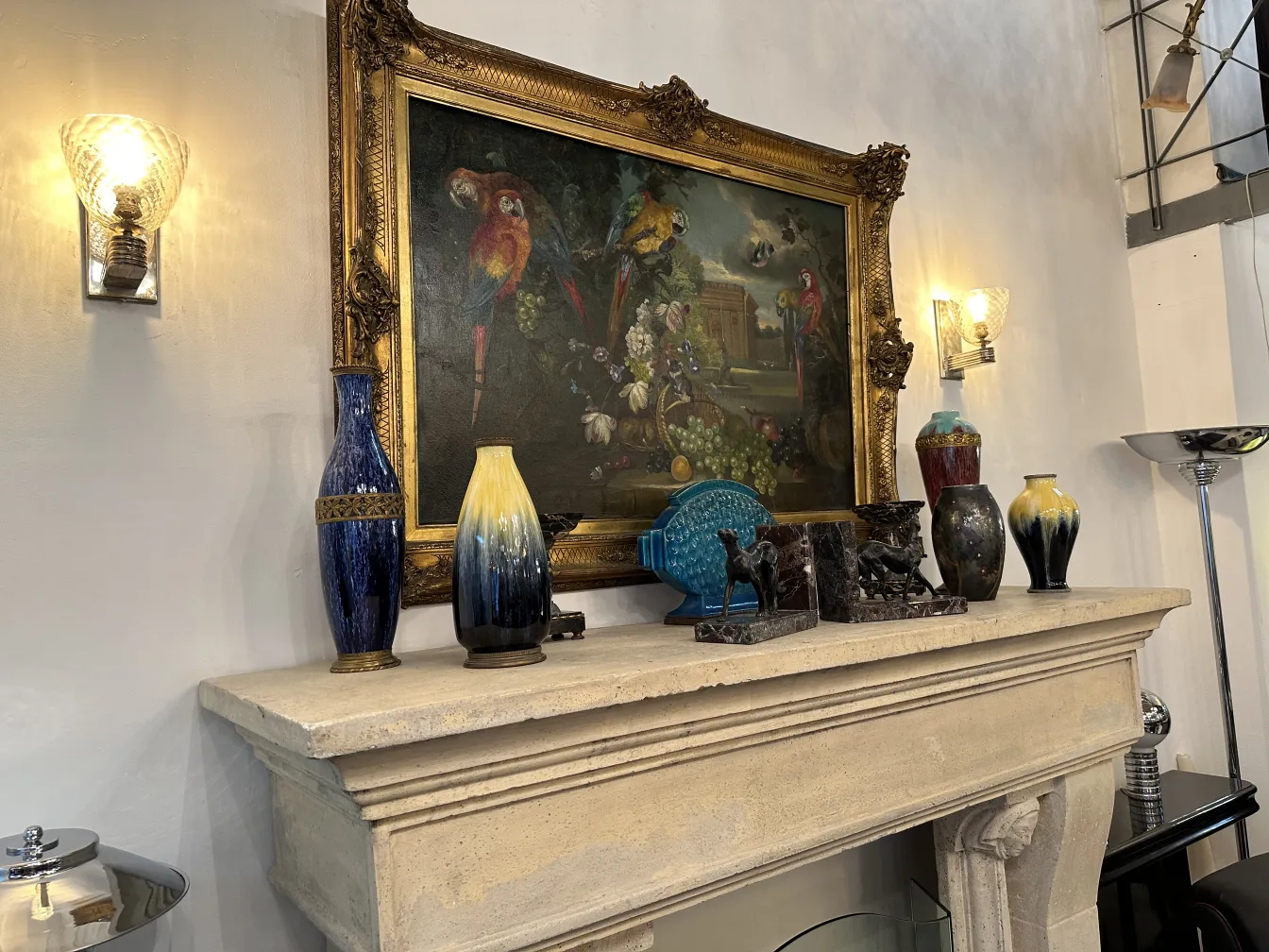 Decorative vases and antique paintings on a shelf