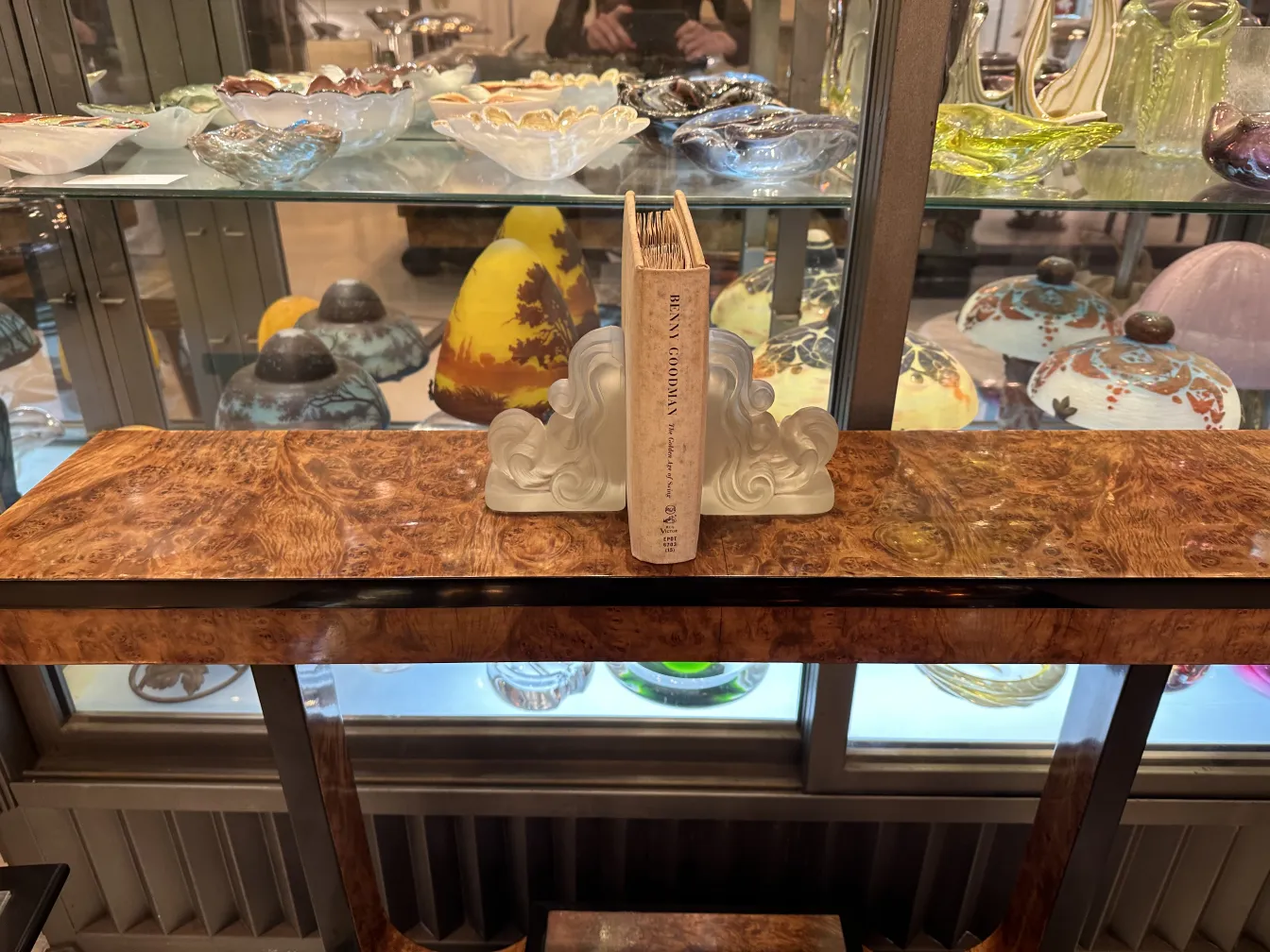 Antique decorative bookends on display