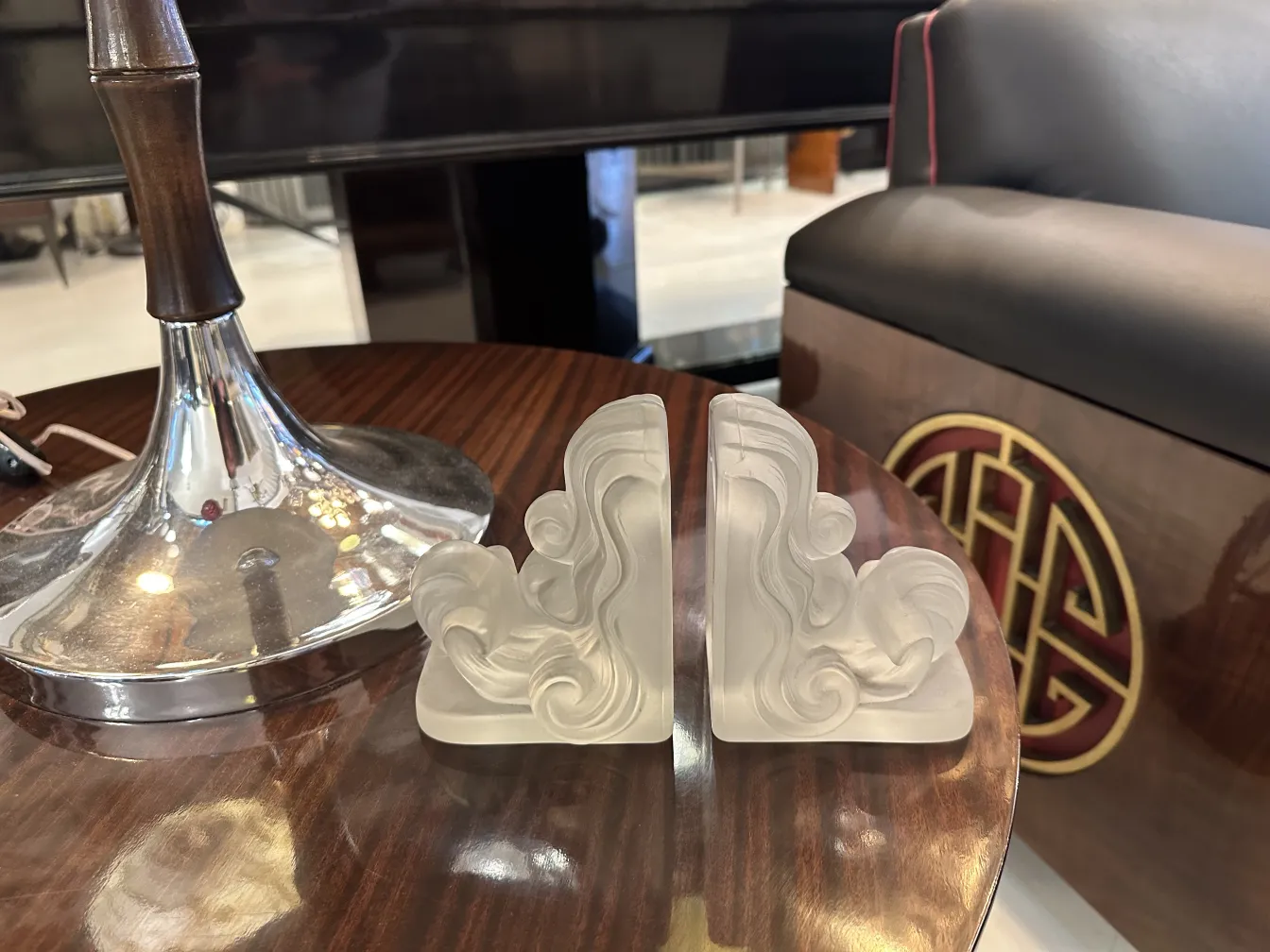 antique bookends with elegant design on a table