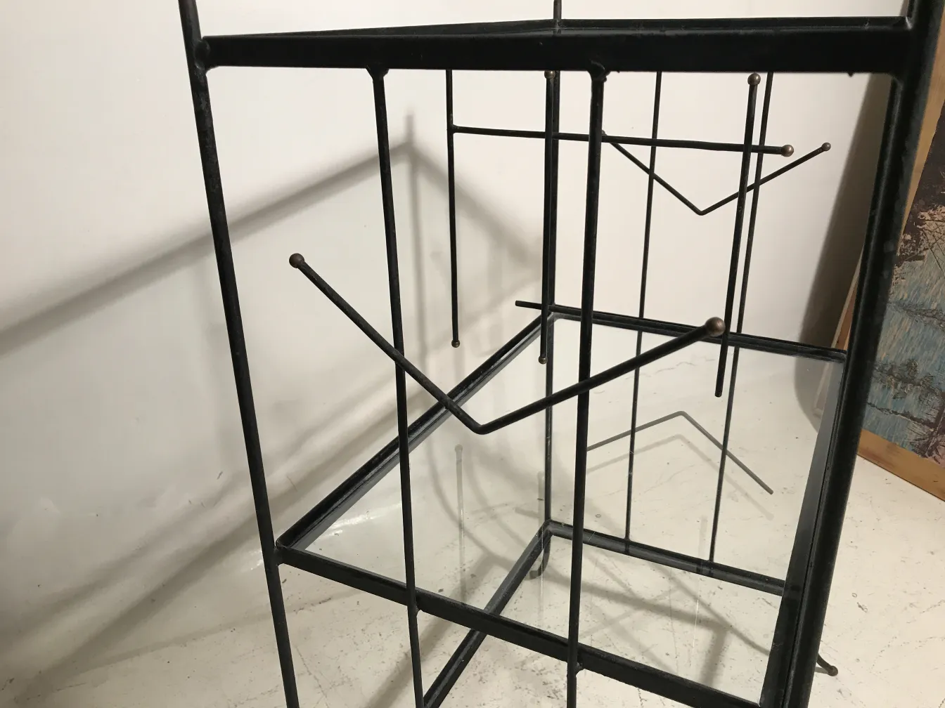 Antique bookcase with adjustable shelves and simple design.