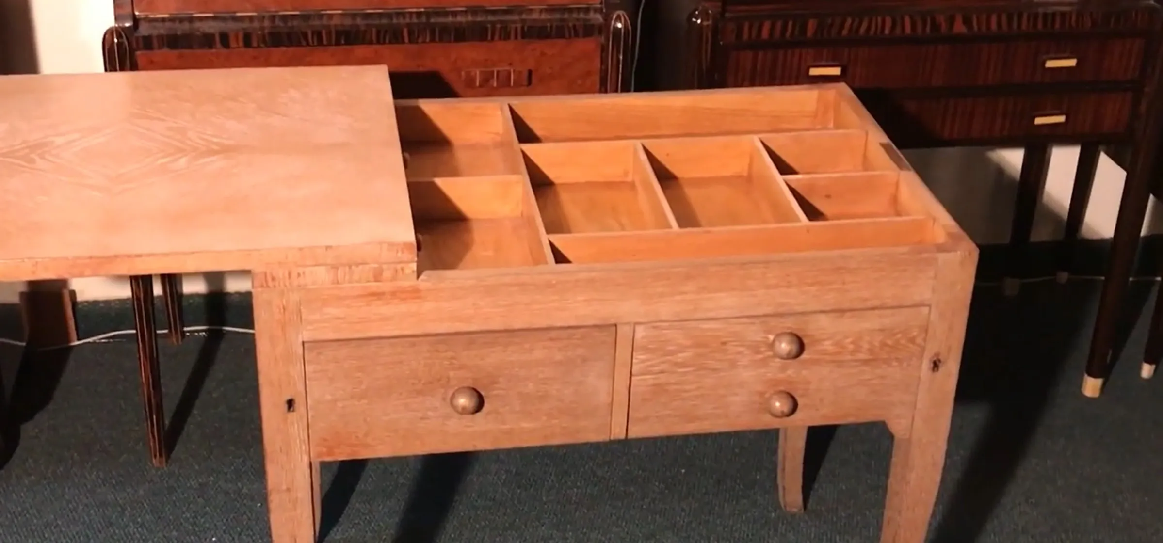 Antique wooden desk with storage compartments and two drawers