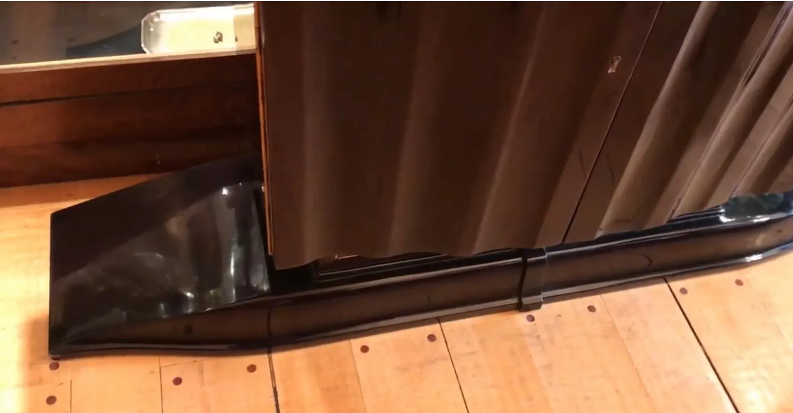 View of 2 antique consoles with decorative details