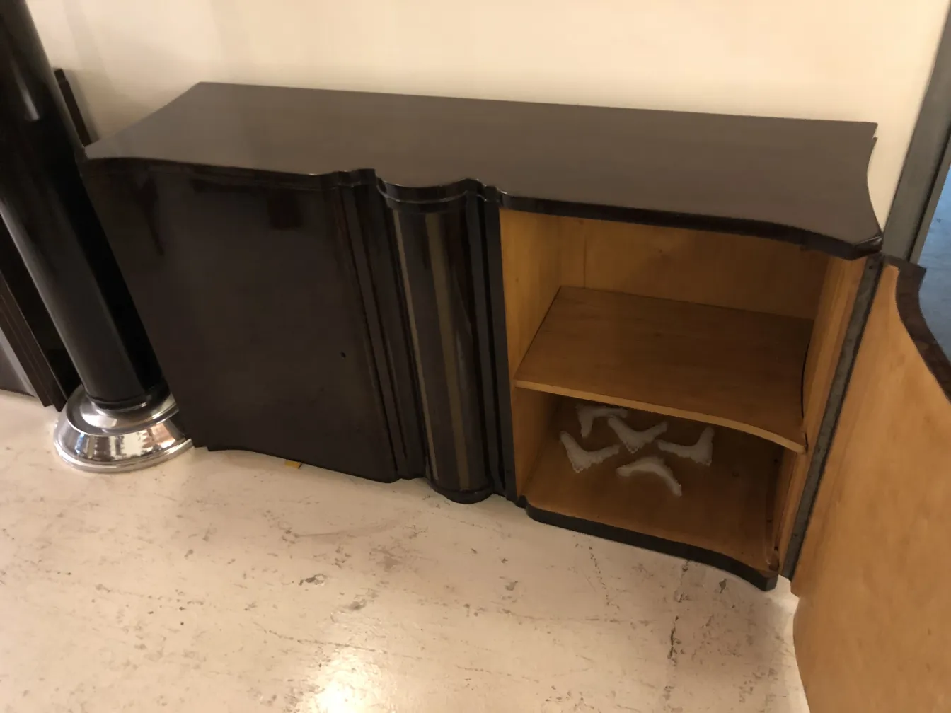 two antique decorative consoles with curved features