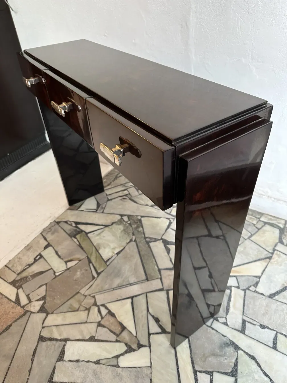 two antique consoles with elegant finishes