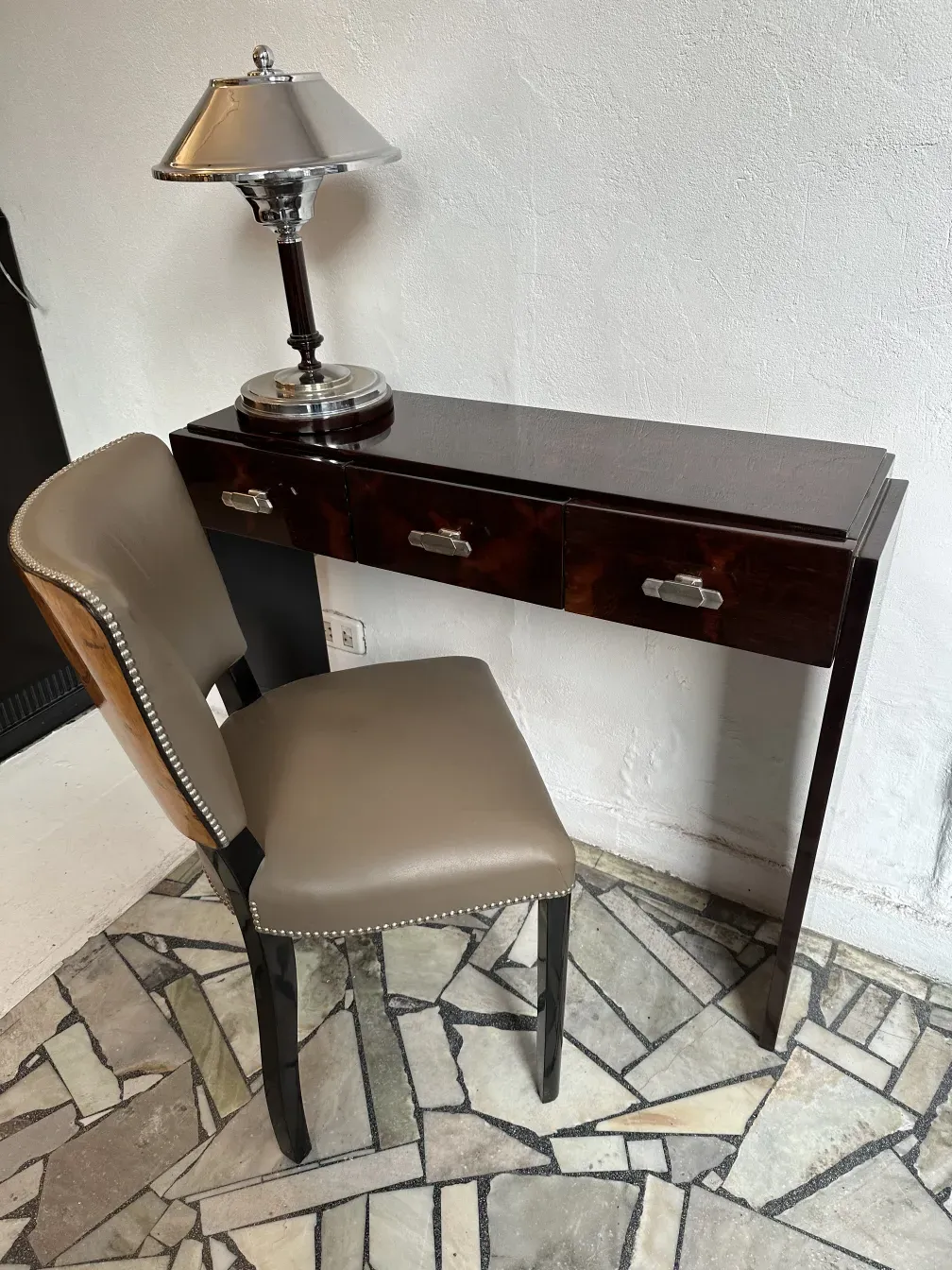 Two antique consoles featuring refined design and elegance