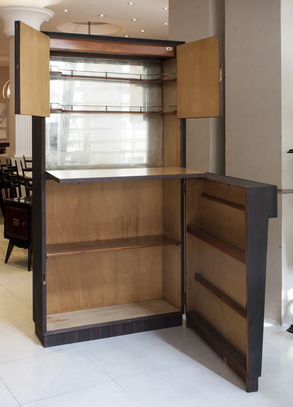 Antique bar with shelves and elegant finishes