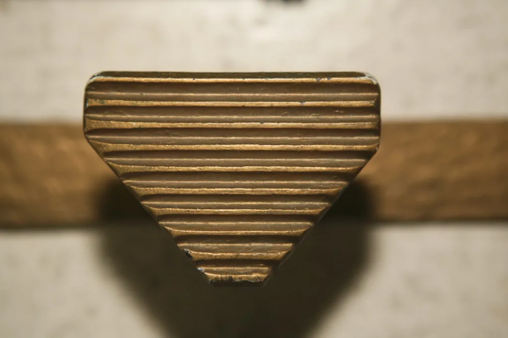 top view of an antique coat rack with pattern