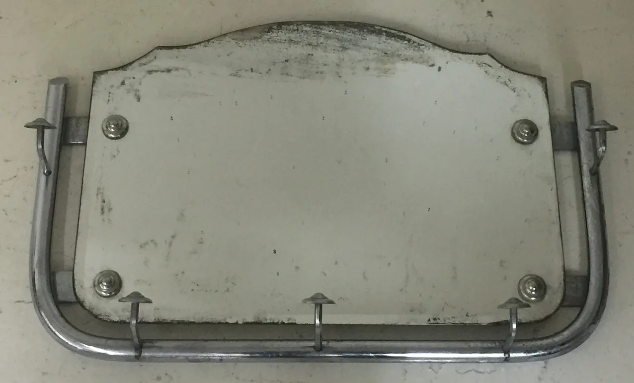 antique art deco mirror with decorative frame