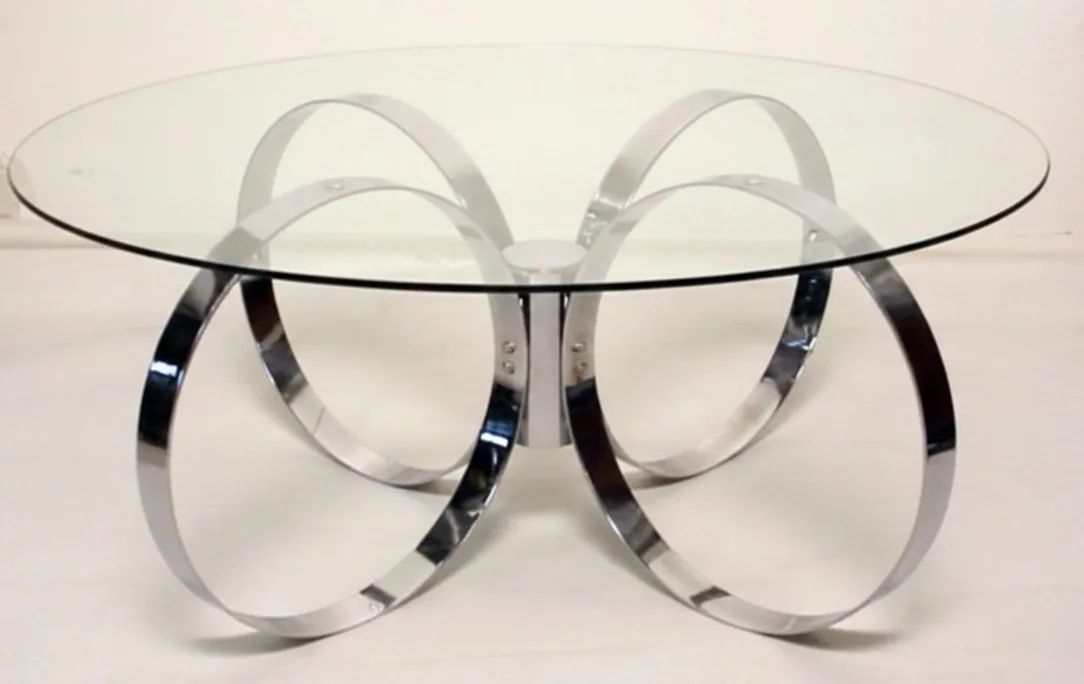 antiker couchtisch in runder Form mit Metallbasis