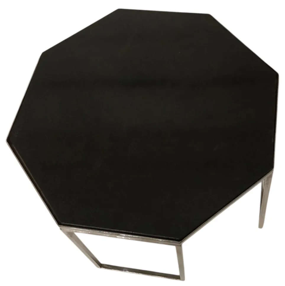 mesa ratona octagonal con un acabado negro elegante, ideal para el salón, estilo de donald deskey