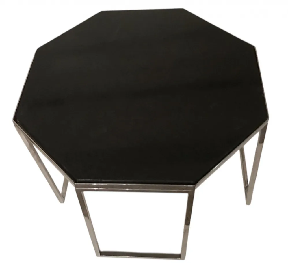 table basse antique octogonale noire avec pieds en métal, style Donald Deskey, dans un cadre élégant avec d'autres meubles