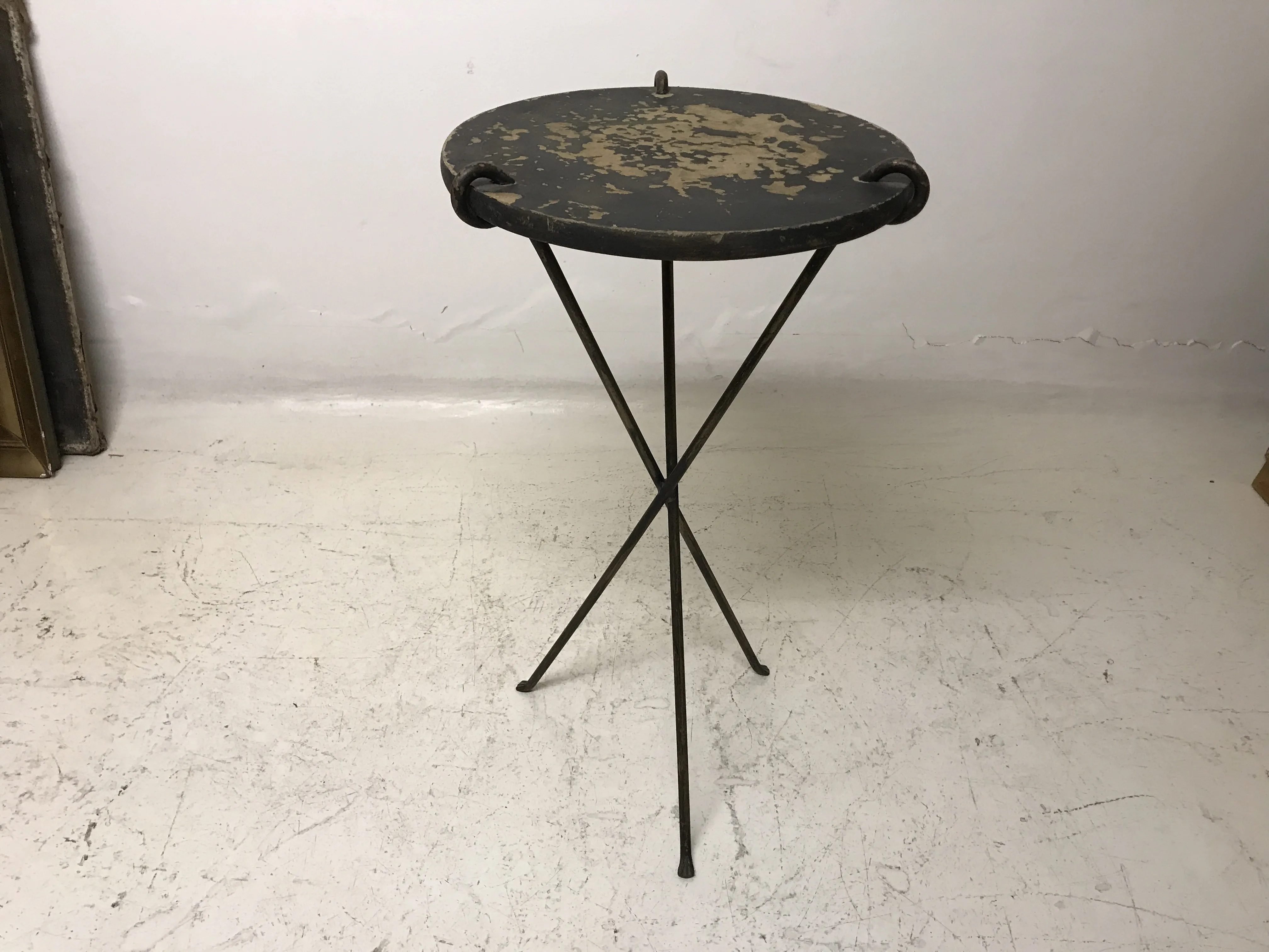 antique small table with a round top and curved legs