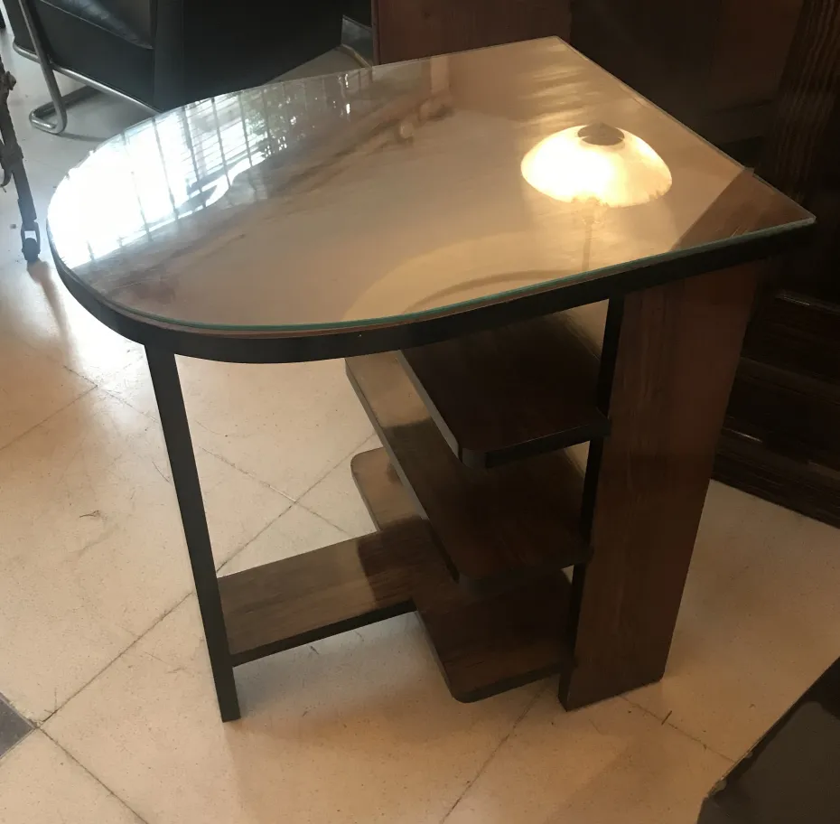 antique art deco table with a curved design and shelves
